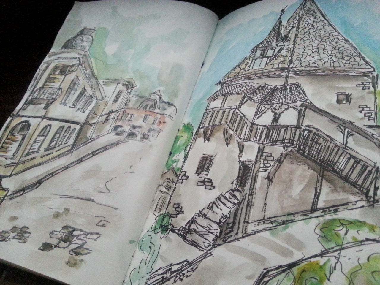 Sketching buildings in watercolor