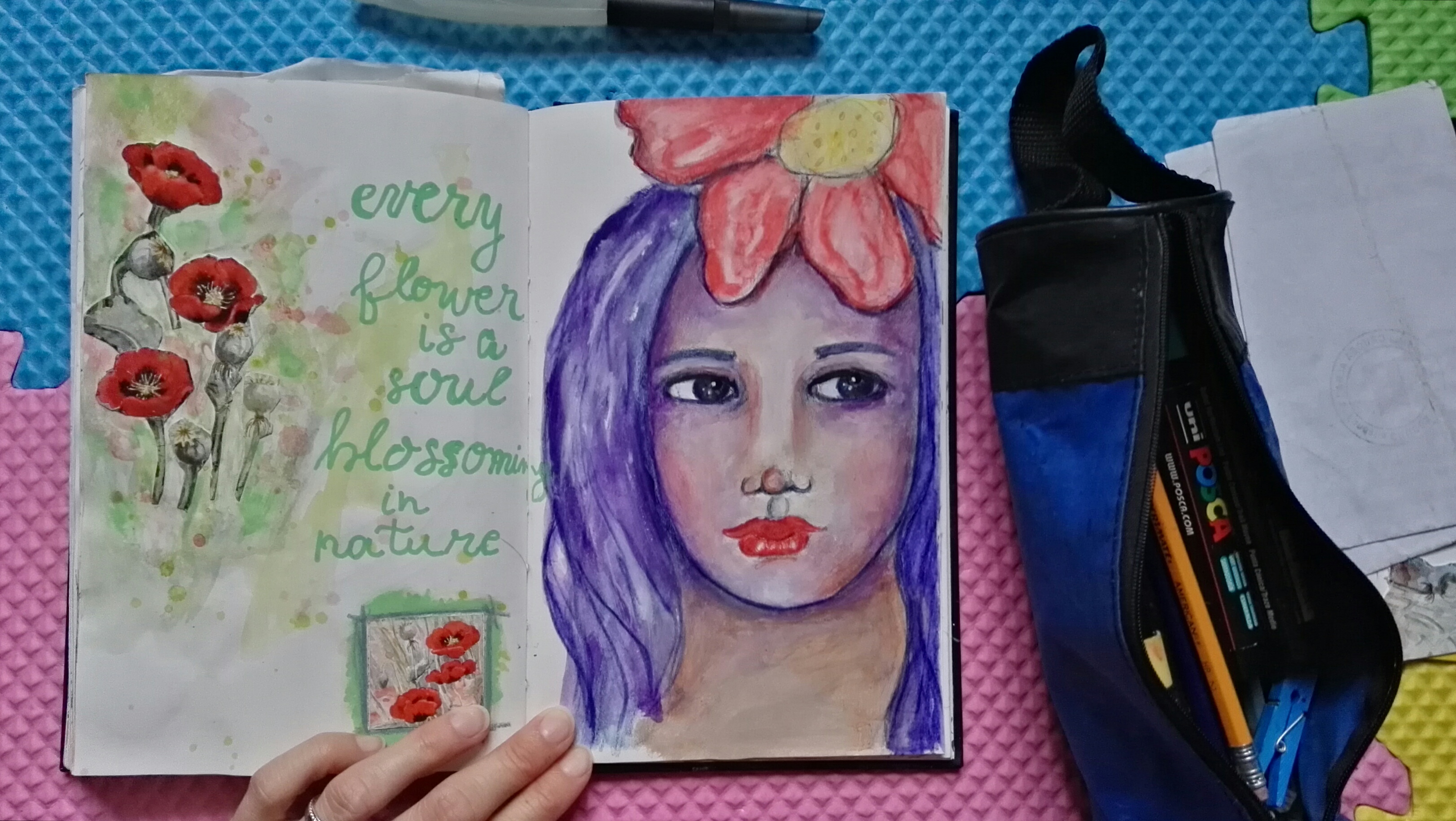 Art in my journal: Whimsical Face with purple hair and the Quoted Pages